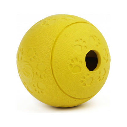 Yellow treat dispensing dog ball with paw print texture and round treat opening
