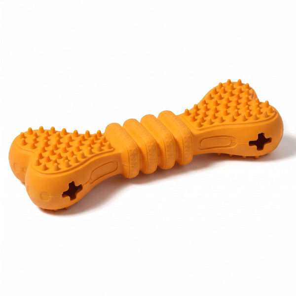 Orange treat dispensing chew bone, rubber dog chew toy with nubbed ends and kibble holes