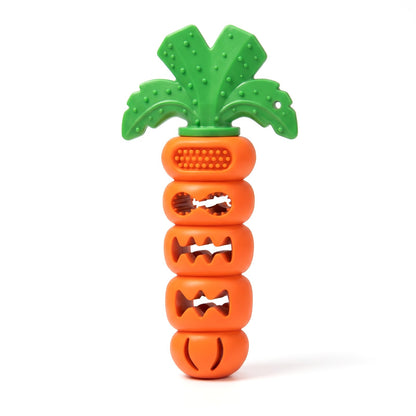 Carrot shaped treat dispensing dog chew toy in orange with green leafy top