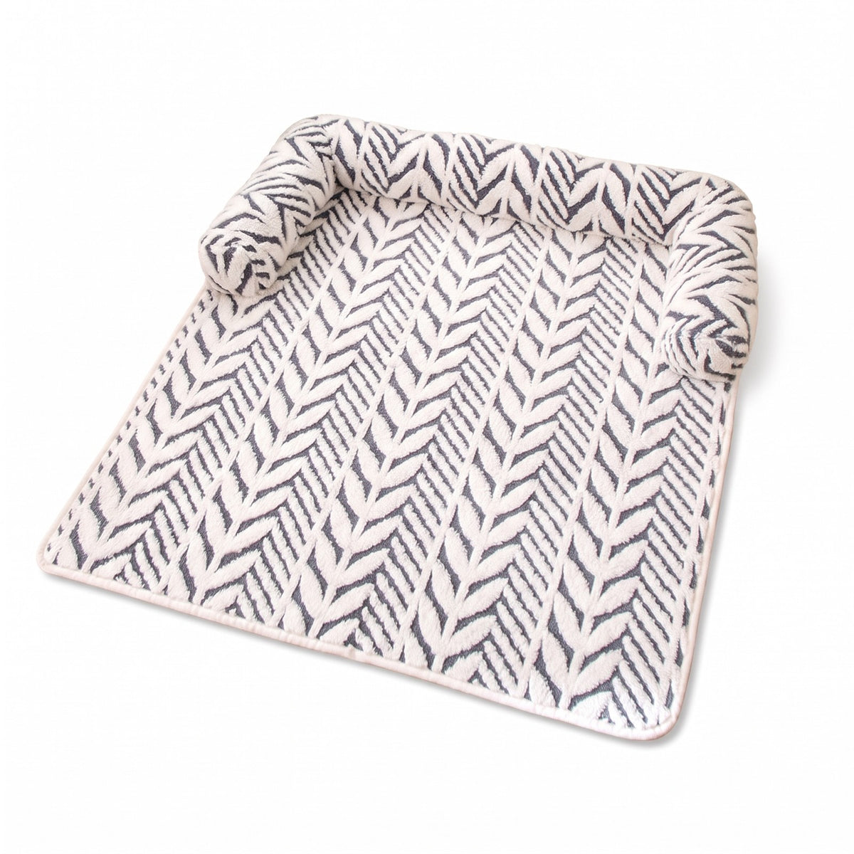 Grey dog bed mat on a white background
