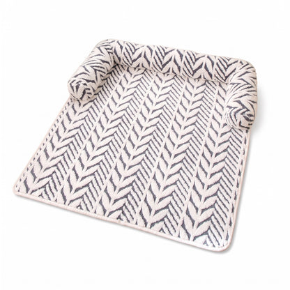 Grey dog bed mat on a white background