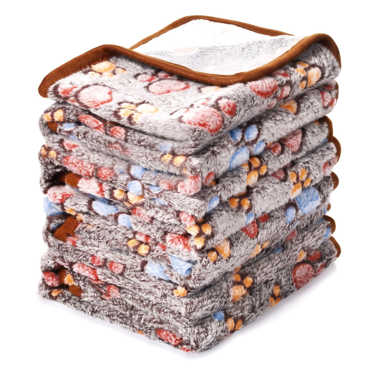 Oatmeal fleece dog blanket with rust and blue paw prints