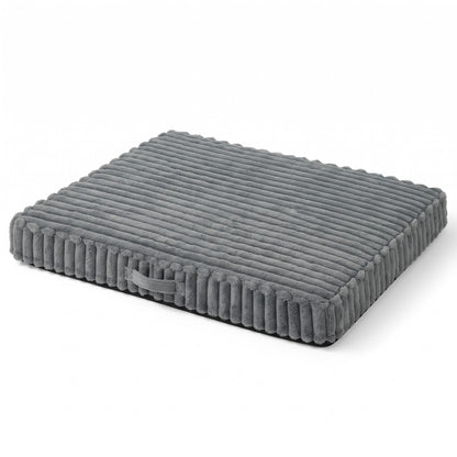 Grey dog crate mat on a white background