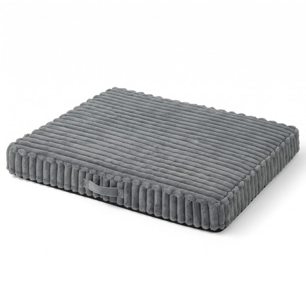 Grey dog crate mat on a white background