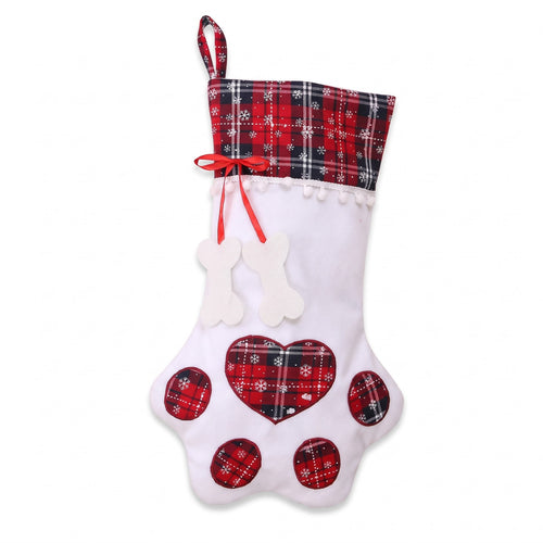 Dog Christmas stocking in Red Snowflake Check with paw shaped foot and felt bone charms