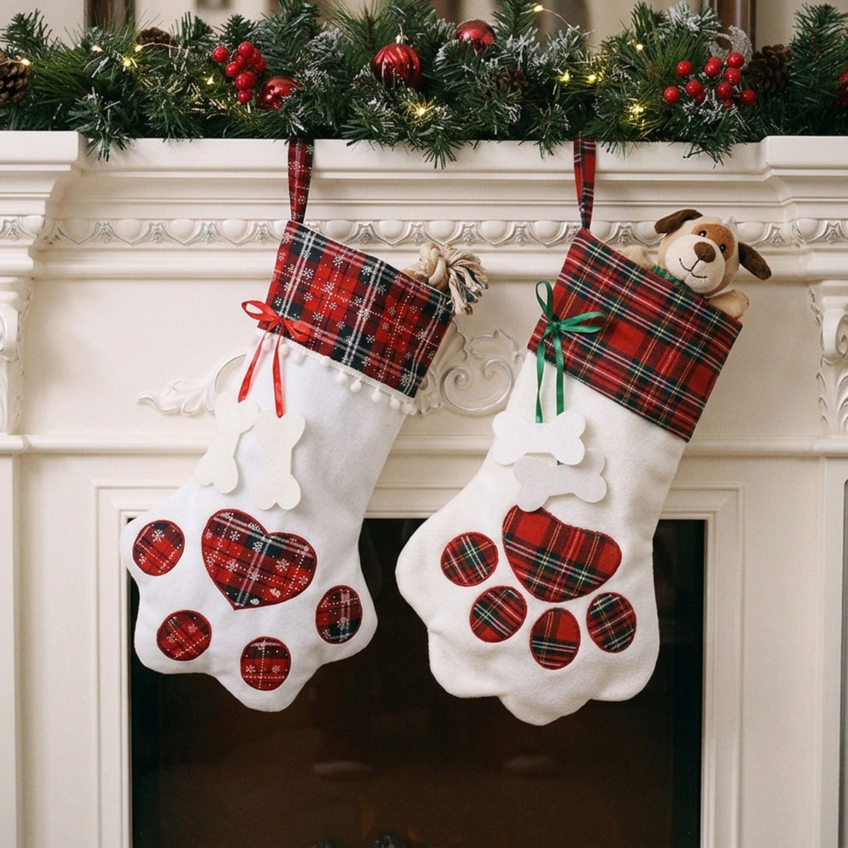Two dog Christmas stockings hung on a decorated mantelpiece with dog toys inside