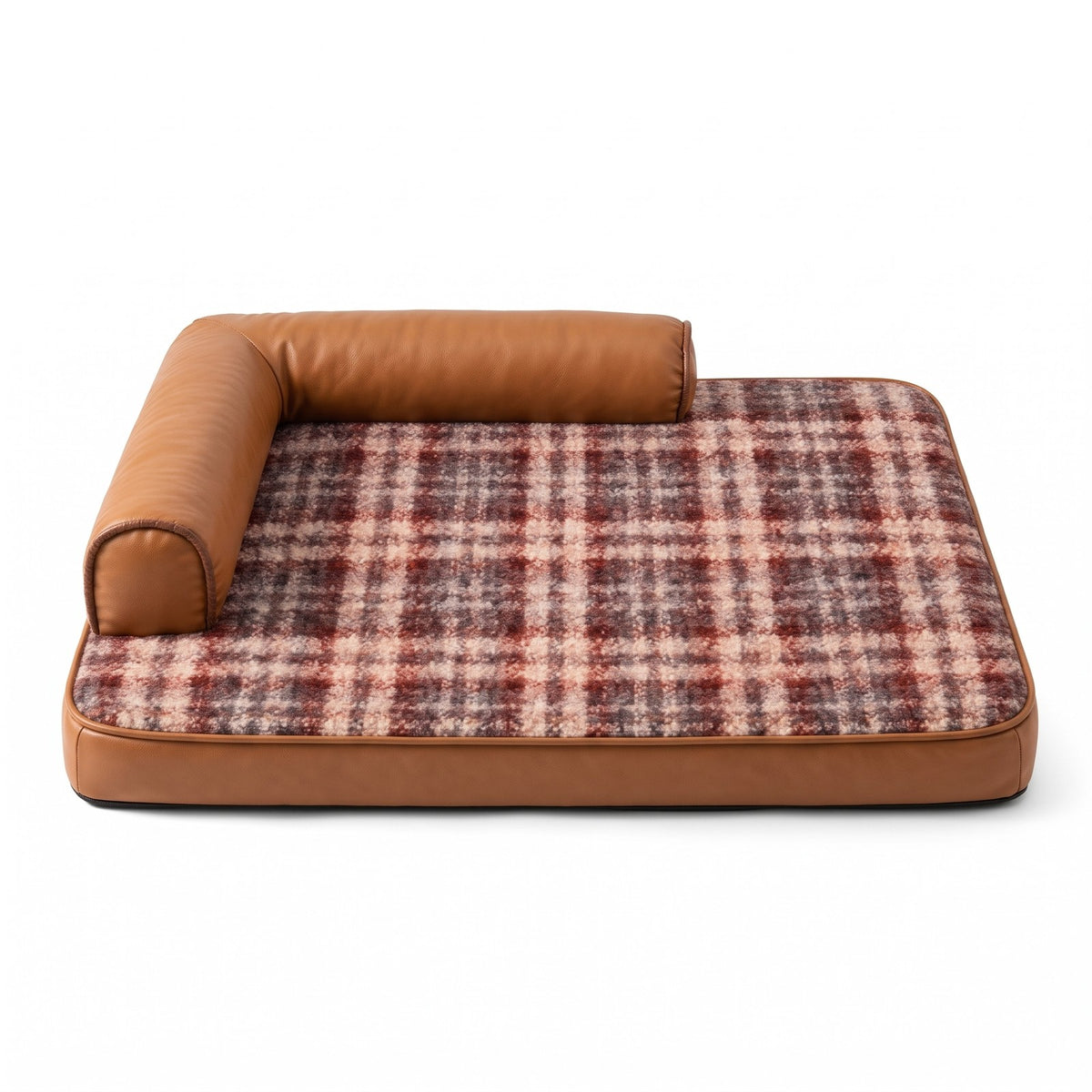 Dog sofa bed with tan faux leather bolster and red plaid top
