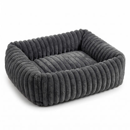 Charcoal fluffy dog bed on a white background