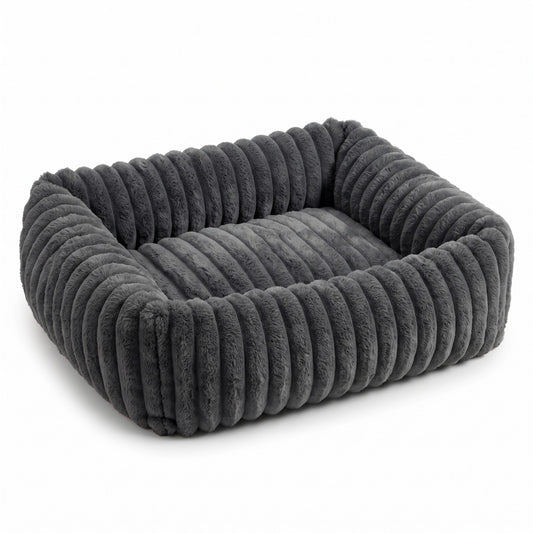 Charcoal fluffy dog bed on a white background