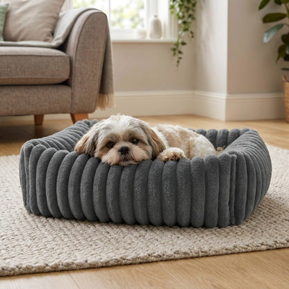 Shih Tzu snuggled in the charcoal fluffy dog bed