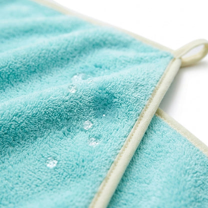 Close up of plush coral fleece microfibre dog towel and bound edge