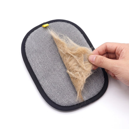 Sheet of dog hair peeled off the pet hair remover glove
