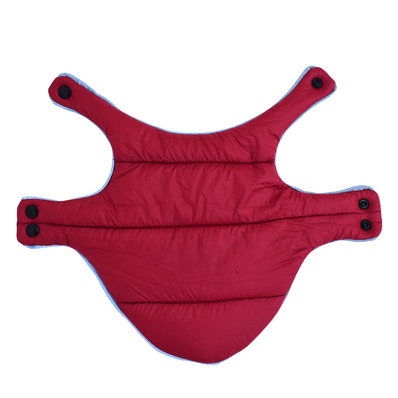 Padded dog coat laid flat showing straps with press studs