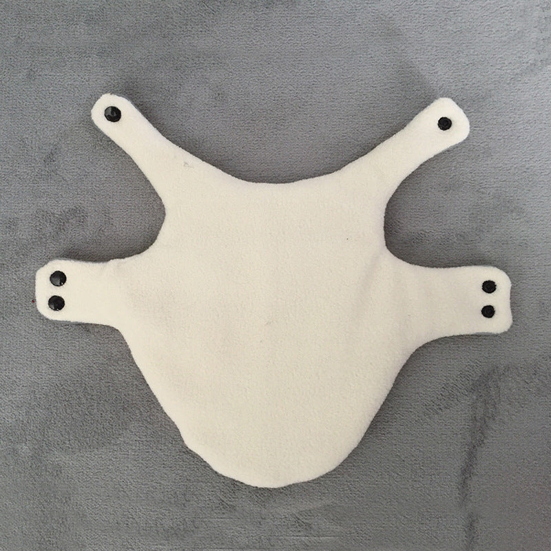 Soft cream fleece lining inside the dog coat with press-stud straps