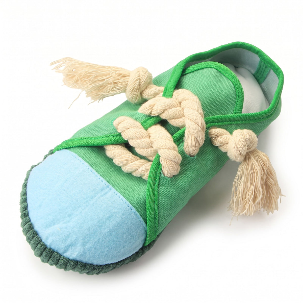 Green low top sneaker squeaky dog toy with sky blue toe cap