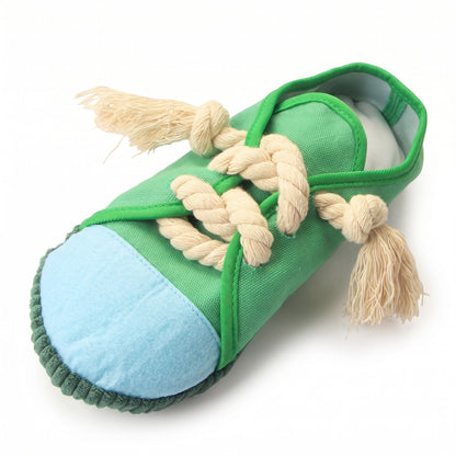 Green low top sneaker squeaky dog toy with sky blue toe cap