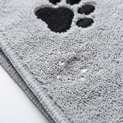 Close up of thick looped terry microfibre and paw print embroidery